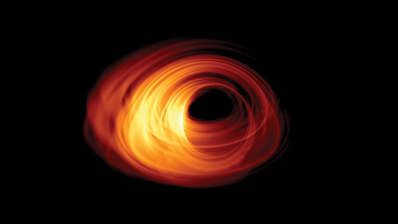 物質が落下していくブラックホールのシミュレーション画像。画像の中心には事象の地平線があり、周囲を回る降着円盤の中に影として見えています。
Credit: Bronzwaer/Davelaar/Moscibrodzka/Falcke/Radboud University