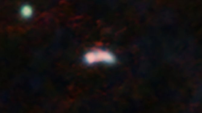 Astronomers discover a superheated star factory in the early universe   ~Hot dust indicates the rapid growth of the early galaxy~ 